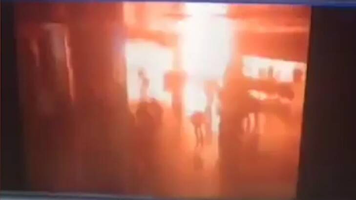 A screenshot of CCTV footage, reportedly capturing the moment of an explosion inside the airport. 