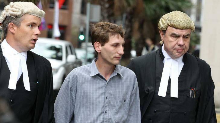 Jonathan Moylan (centre) arrives for sentencing at the NSW Supreme Court on Friday. Photo: Ben Rushton - Getty Images