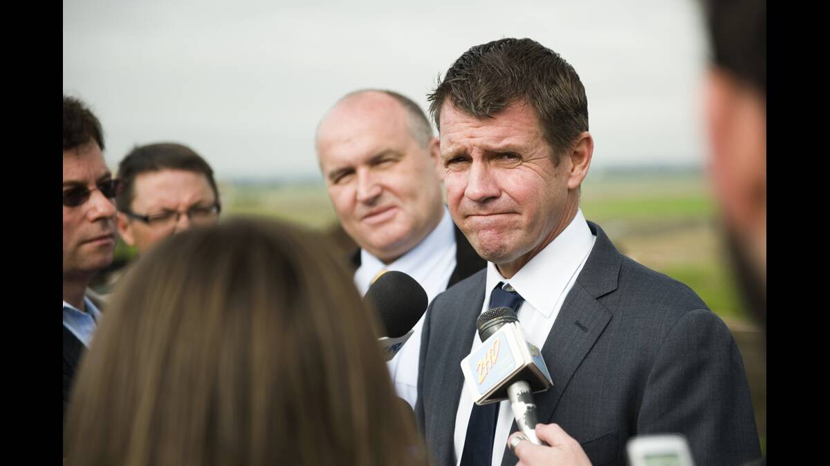 Premier Mike Baird remains tight lipped on the funding model and timetable for the Lower Hunter hospital.