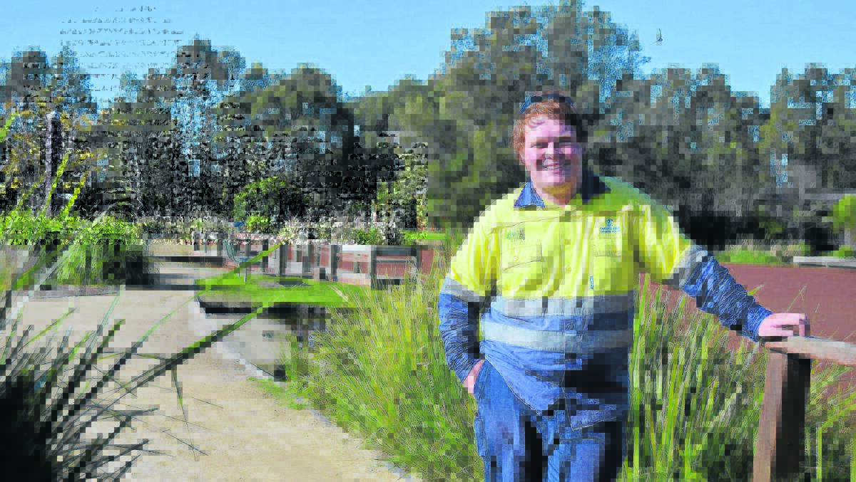 POSITIVE ENVIRONMENT: Josh Payne of East Maitland is part of the Green Army that helps protect the Hunter Wetlands.  	Picture by SAM NORRIS