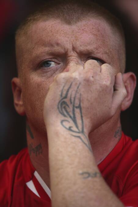A Liverpool fan shows the raw emotion still attached to the Hillsborough Disaster.
