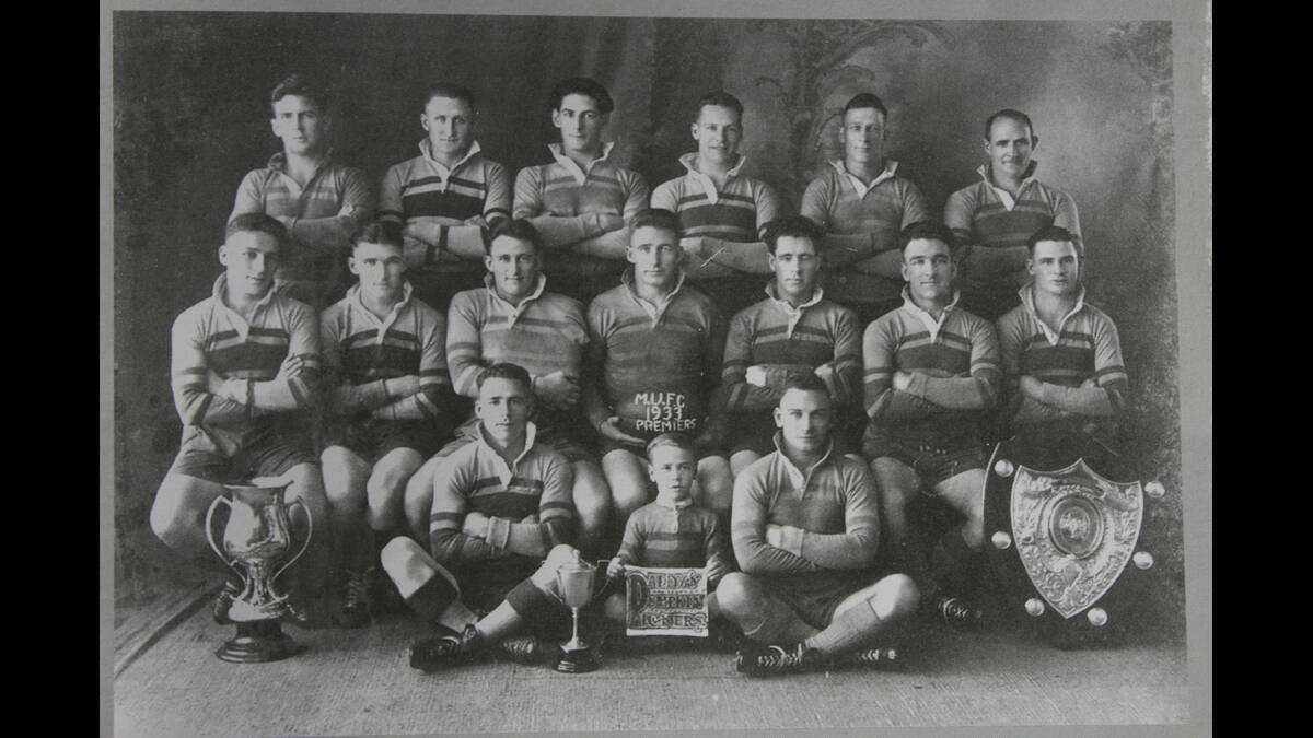 FIRST PREMIERSHIP:  Maitland’s first premiership-winning team from 1933. Back: J McIntyre, G Sexton, D Fleming, K Lane, R Hemsworth, D Manning. Middle: R Walsh, C Keating, N Forbes, P Maher (captain-coach), H Johnston, D Lemmon, W Powers. Front: G Bowtell, D Bowtell (mascot), W Bishoff.	