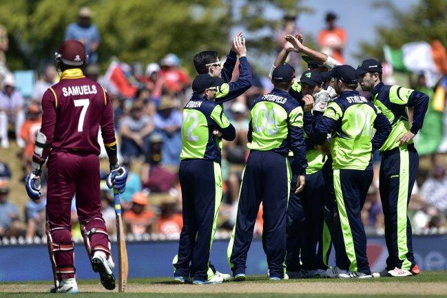 The Irish team celebrates during their victory against the West Indies.
