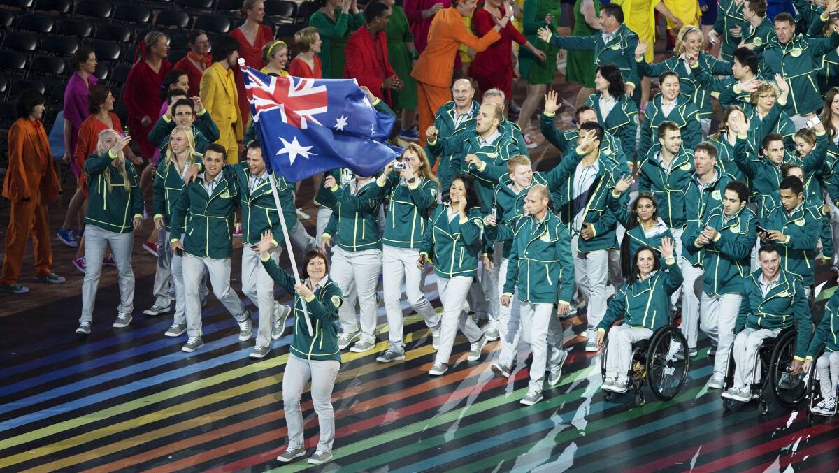 Anna Meares leads the Australian team into Celtic Park during the opening ceremony of the 2014 Commonwealth Games in Glasgow.	
