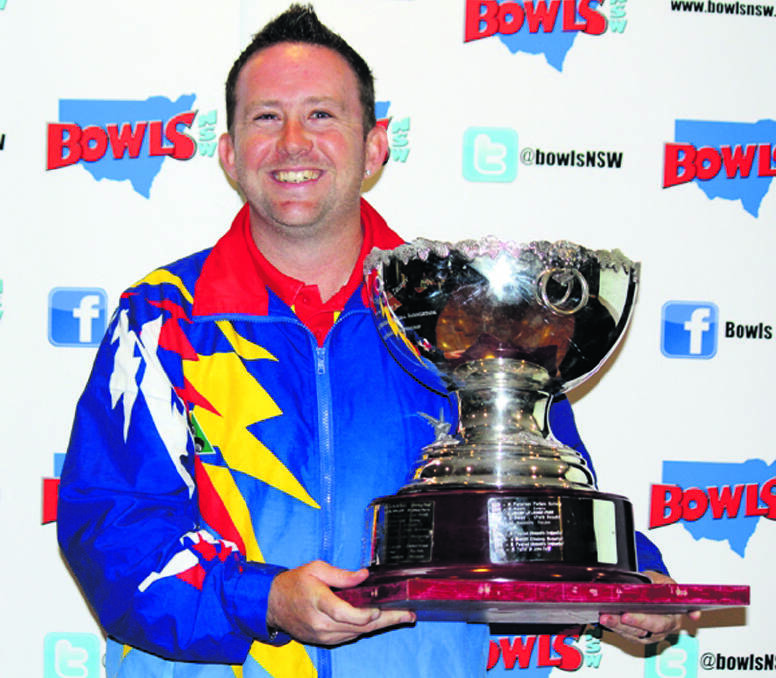 Lennon Scott with the NSW singles trophy.