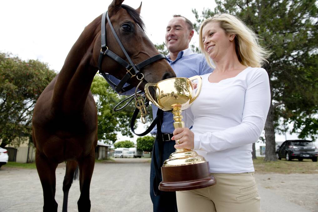 Hunter-owned Melbourne Cup winner with Australian Bloodstock co-owners Jamie and Kellie Lovett.