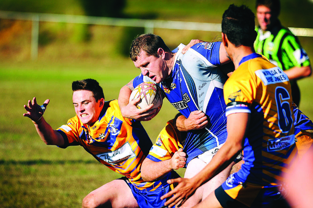 Mitchell Bird makes a strong run for the Greta Branxton Colts during their 38-16 win against Muswellbrook. 
