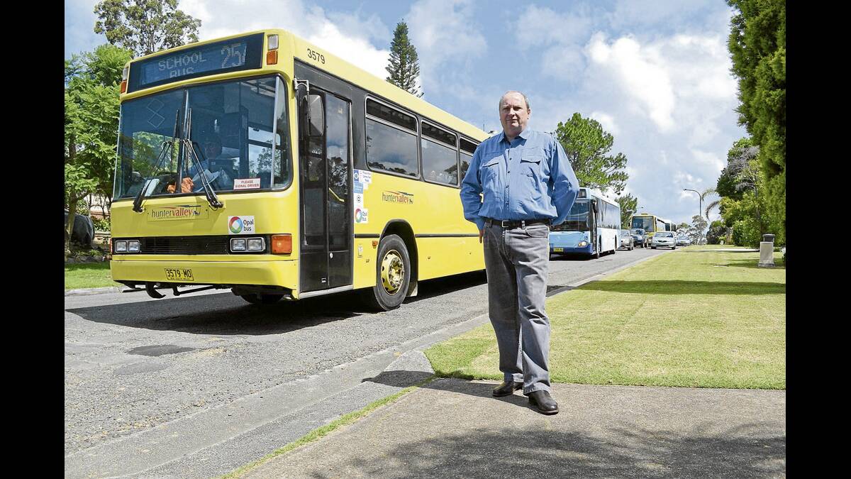 bus boulevard:  Resident Philip Naughton said more than 20 buses were using the street every school morning and afternoon.  	Picture JESSICA BROWN