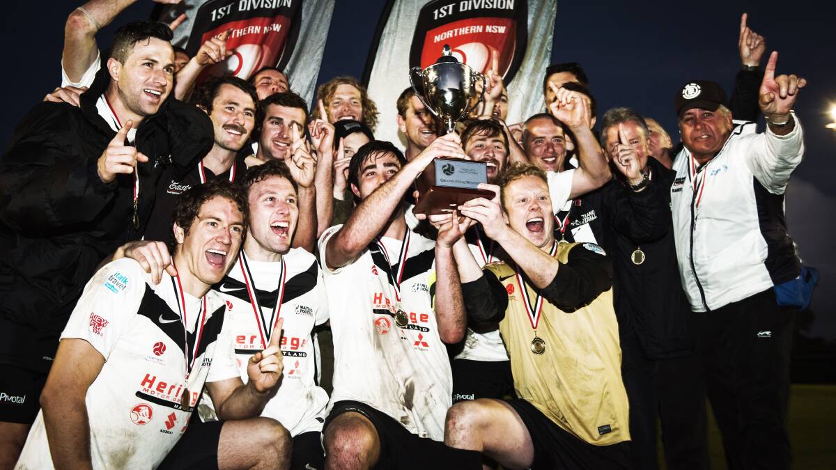 The Magpies celebrate the cup double adding yesterday’s grand final win to their minor premiership and promotion.