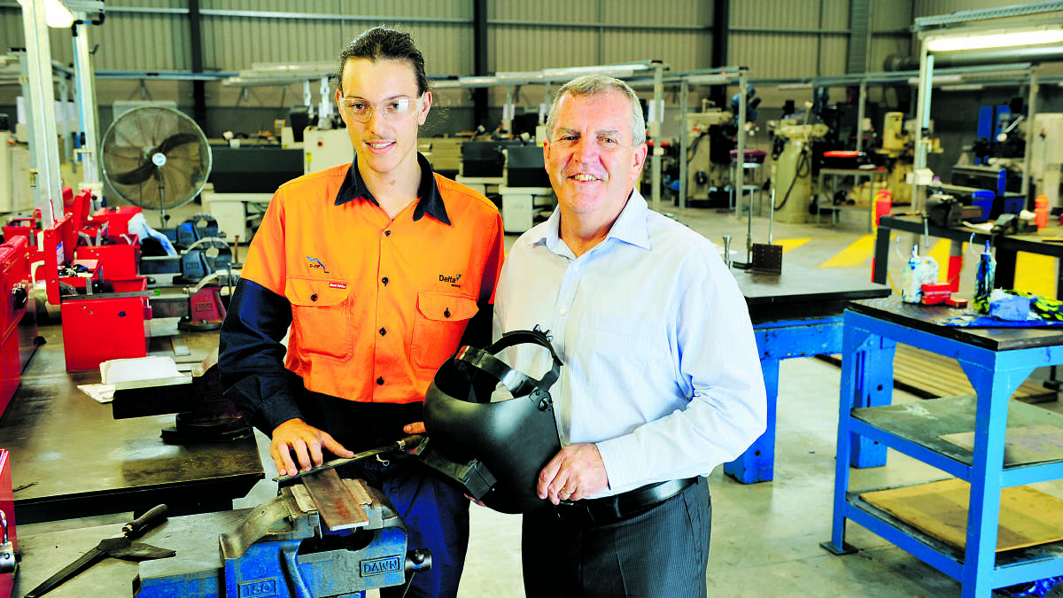 PARTNERSHIP: First year apprentice boilermaker Khie Crossley with HVTC registered training organisation manager Michael Murray.
