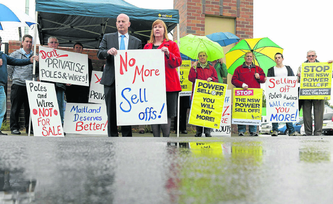 Opposition Leader John Robertson with protesters in Maitland yesterday.