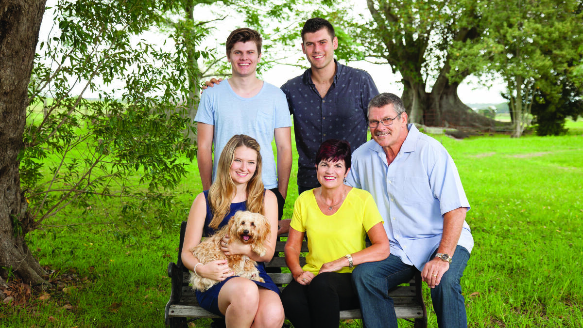 Robyn Parker with husband David, daughter Chelsea and sons Heath and Dylan, with Toffee the dog. 