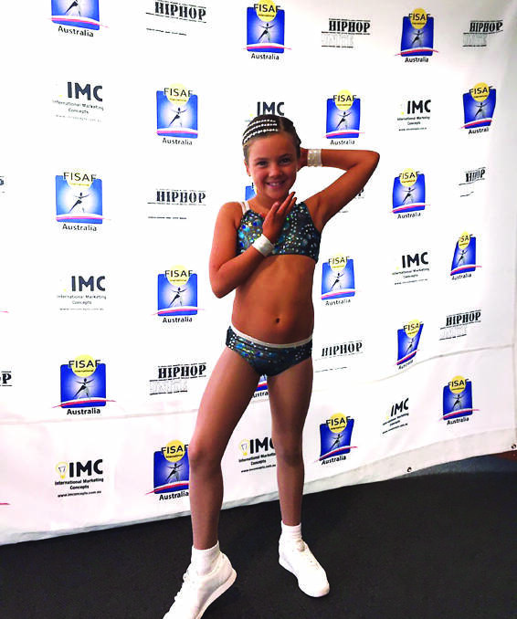 GROWING IN CONFIDENCE: Avah Buckley placed fourth at the Federation of International Sport Aerobics and Fitness state finals.