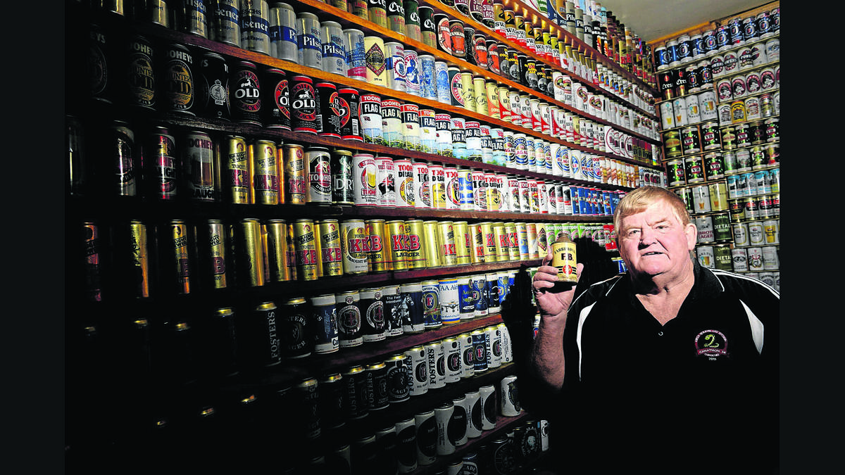 CAN-DO:   Lindsay Watson with some of his beer can collection.  Picture by STUART SCOTT