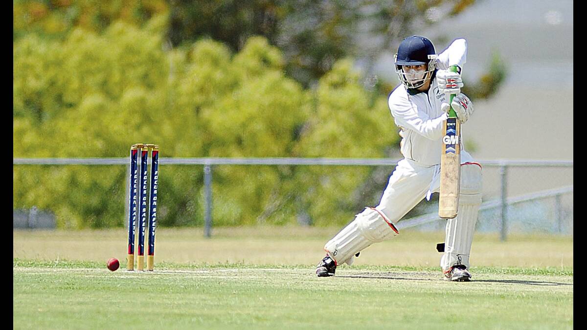 IN CONTROL:  Western Suburbs batsman Tom Irwin plays a controlled stroke on his way to making 70 against Eastern Suburbs.  	Picture  by CATH BOWEN 