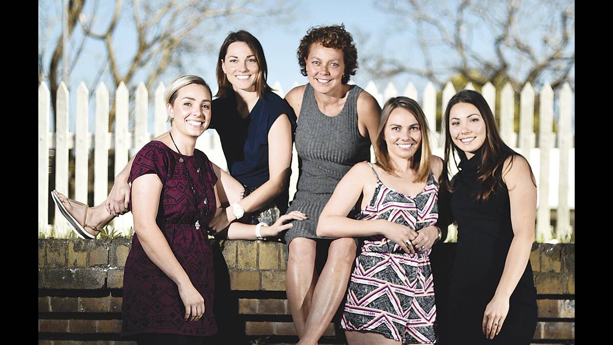 STICKING TOGETHER: Tanya Lawrence (centre) with her daughters Lana Johnston, Tahnee Riches, Kylie Hirst and Ashlee Lawrence.   	Picture by PERRY DUFFIN