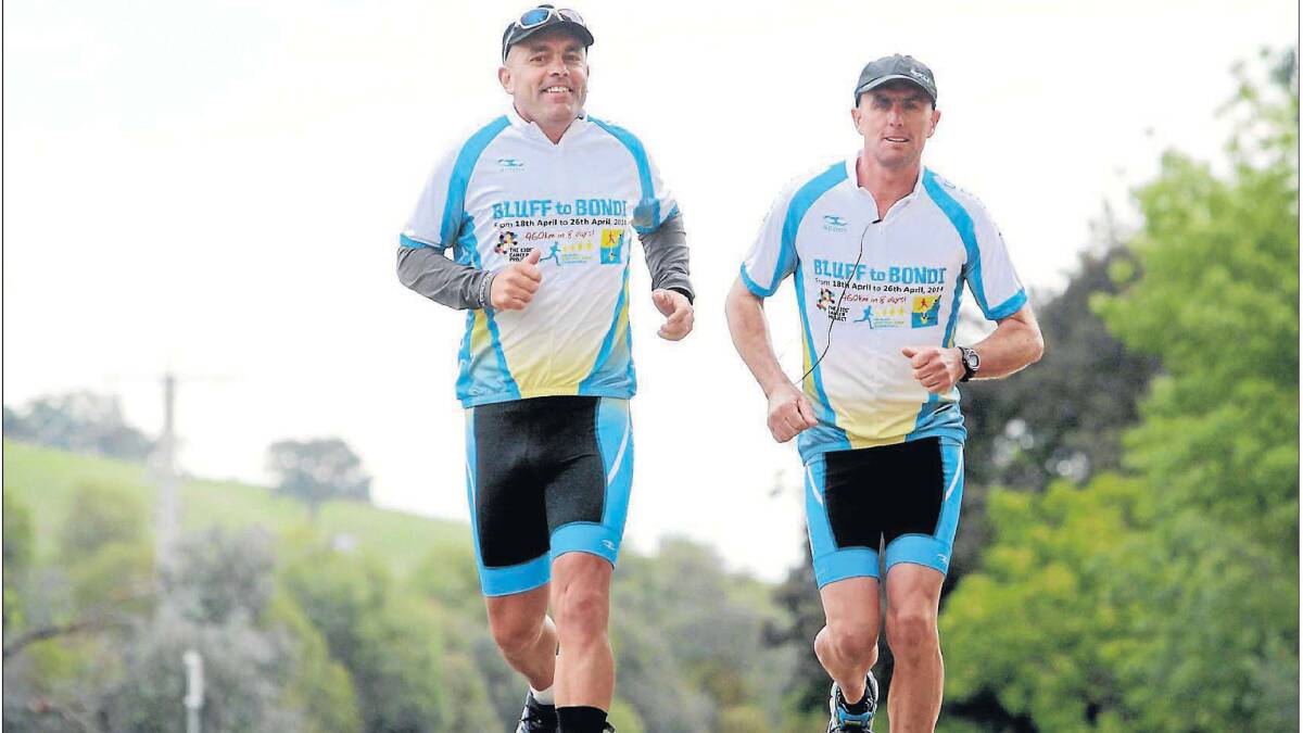 ON THE ROAD: Tim Blair and Shane Taylor arriving in Wodonga, Victoria, on their Bluff to Bondi run. Picture: Matthew Smithwick, The Border Mail.