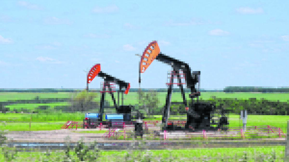 Oil ‘Pump jacks in a paddock Saskatshewan