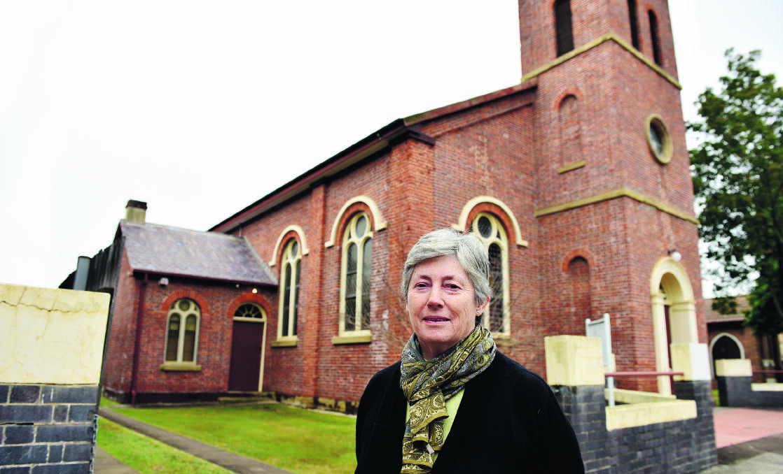 RIOTOUS PAST: Historian Janece McDonald outside the Presbyterian church in Free Church Street.	Picture by CATH BOWEN 