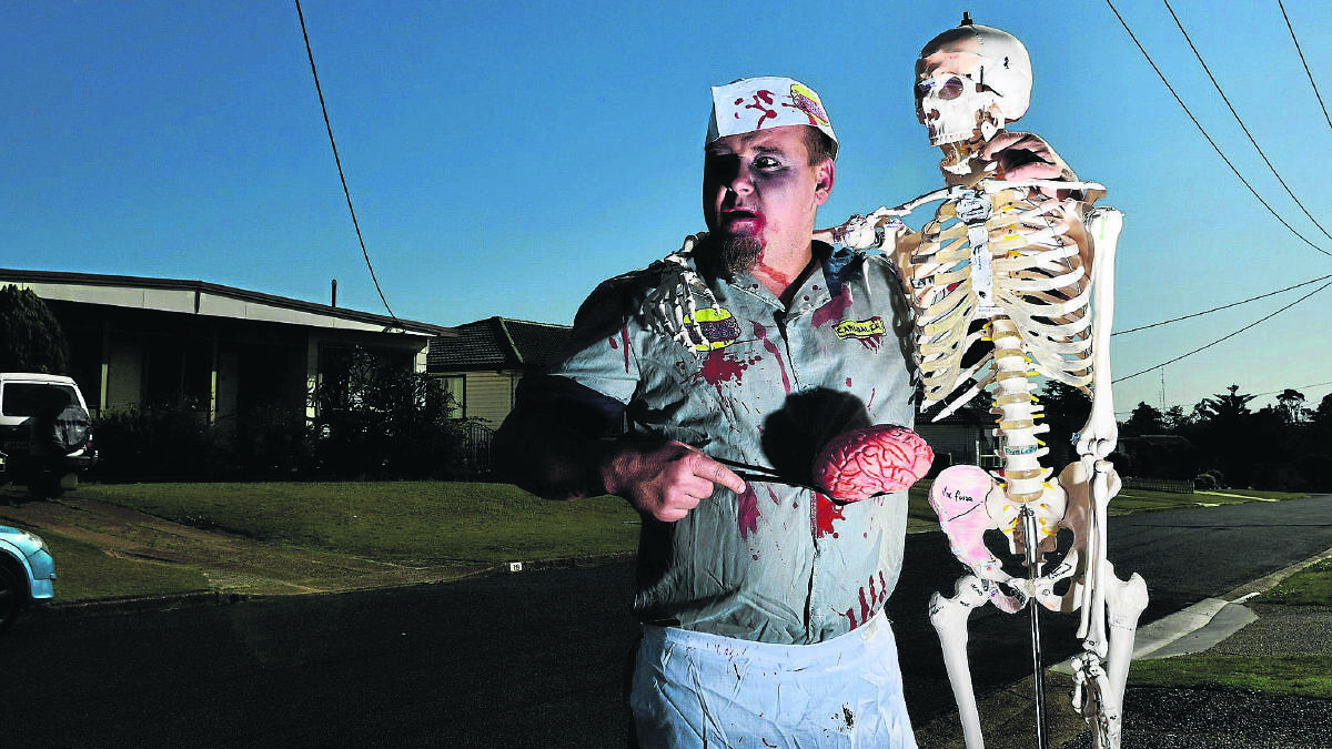 BRAINS OF THE OPERATION:  Mathew Akers gets into the spirit of Halloween. 
	Picture by PERRY DUFFIN 