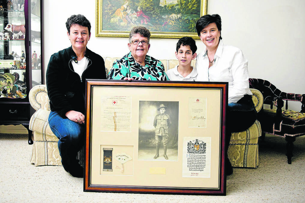 PRIDE:  Bert Poole’s descendents Meredith and Ruth Wilkes, Alex Joshi and Anna Wilkes. Picture PERRY DUFFIN  
