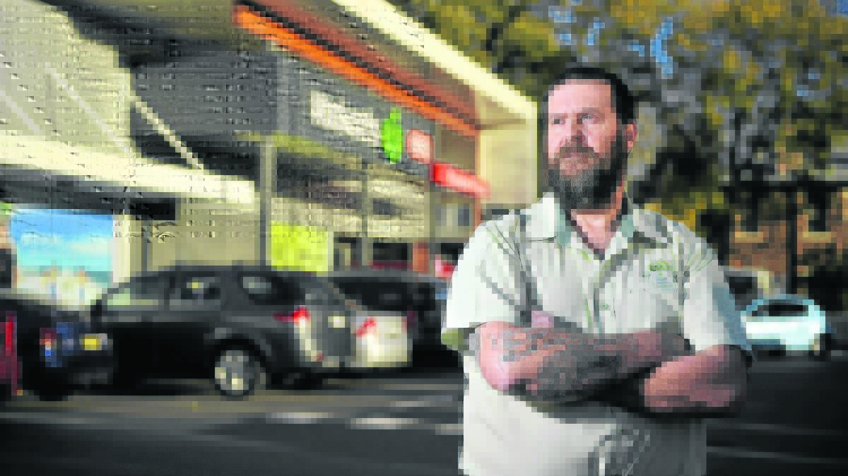 BAD WEEKEND:  Geoff Smith of Maitland Woolworths said the store suffered because car parks weren’t available for shoppers.   	