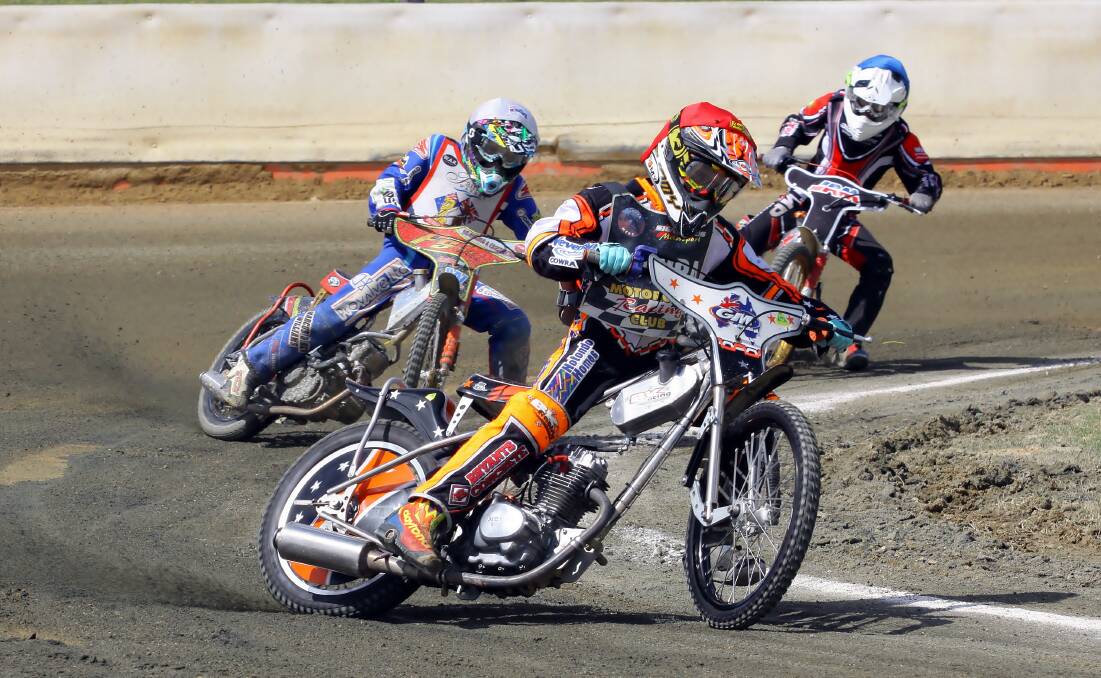 A FINAL: Josh Pickering (red helmet) and Alan McDonald (blue helmet) in the A Final.  	Picture by P & M Galloway.
