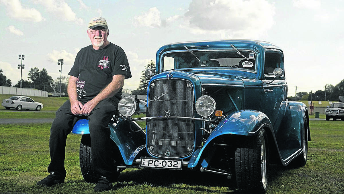 START YOUR ENGINES:  Paul Coombe with his 1932 Ford coupe.	