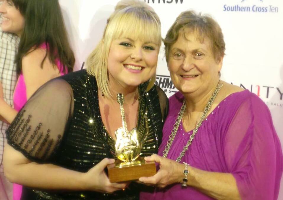 Lyn Bowtell celebrates her Golden Guitar win with her mum Glenys.