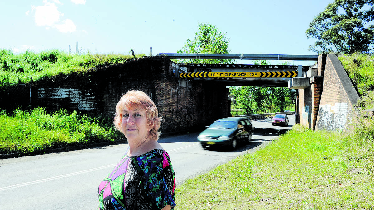 ROAD TO RUIN:  Farley resident Estella Lowe at the underpass she believes is dangerous, especially with increased traffic predicted. 	Picture by CATH BOWEN