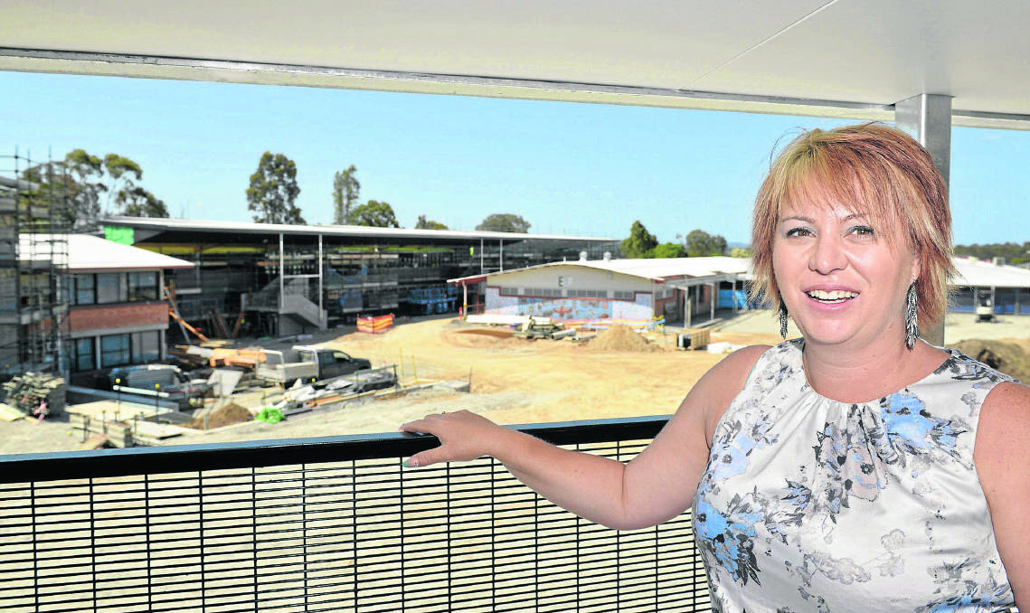 LOOK AT THE FUTURE:  Deputy principal Kylie Fabri overlook the new works.  	Picture by STUART SCOTT