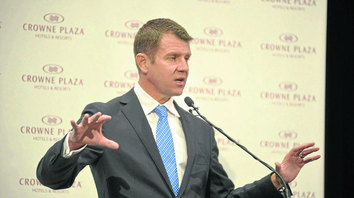 ON A PROMISE:  Premier Mike Baird at Crowne Plaza yesterday where he promised $7m for Maitland roads if the electricity assets were privatised.  	Picture by STUART SCOTT  