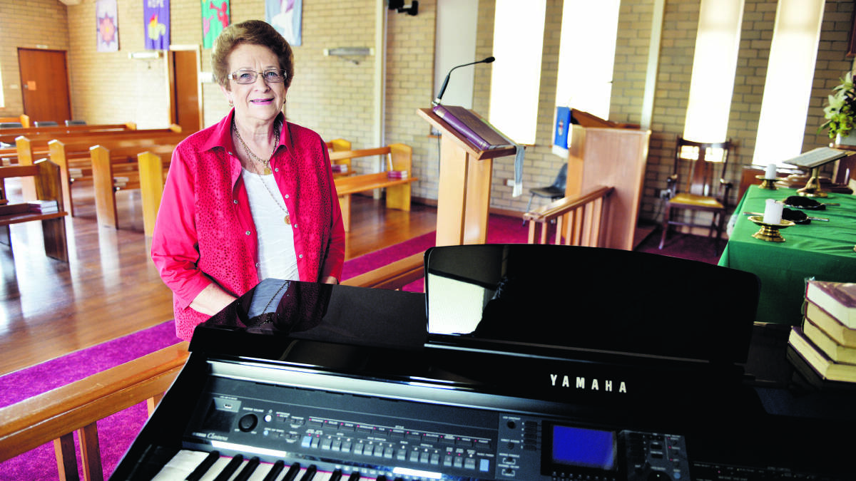 SELF TAUGHT:  Rhonda Amos has cherished playing the organ at Morpeth Uniting Church for the past 50 years.  	Picture by CATH BOWEN