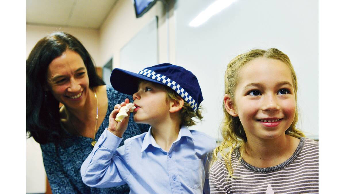 BRAVE GIRL: Valentina Costa with her mother Deborah and brother Mikos at the awards ceremony.  