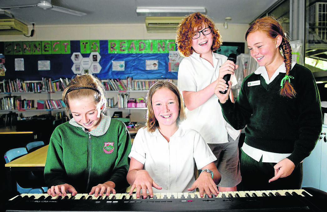 LET’S PLAY:  Year 6 students Haley Martin, Jessica Speechly, Kaleb Williams and Lauren Hunter. 	Picture by PERRY DUFFIN