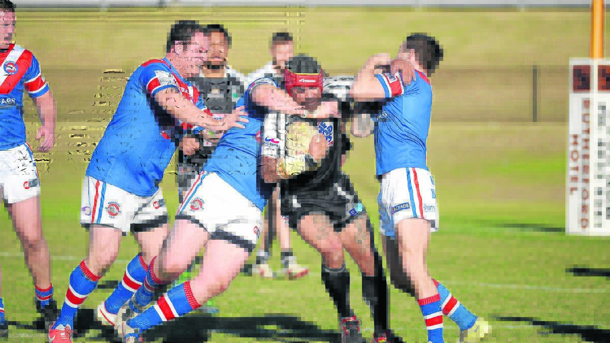 DRAWS OUT:  Maitland Pickers utility Billy Towers tries to cut through Kurri Kurri’s defence.