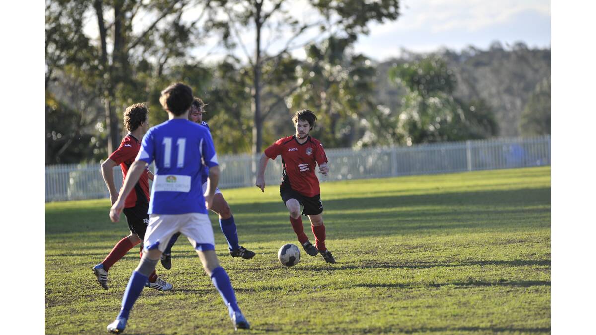 BIG WIN: Jason Walton pushes forward for  the Thornton Redbacks in their 4-0 win over West Wallsend on Sunday.  	Picture by PERRY DUFFIN