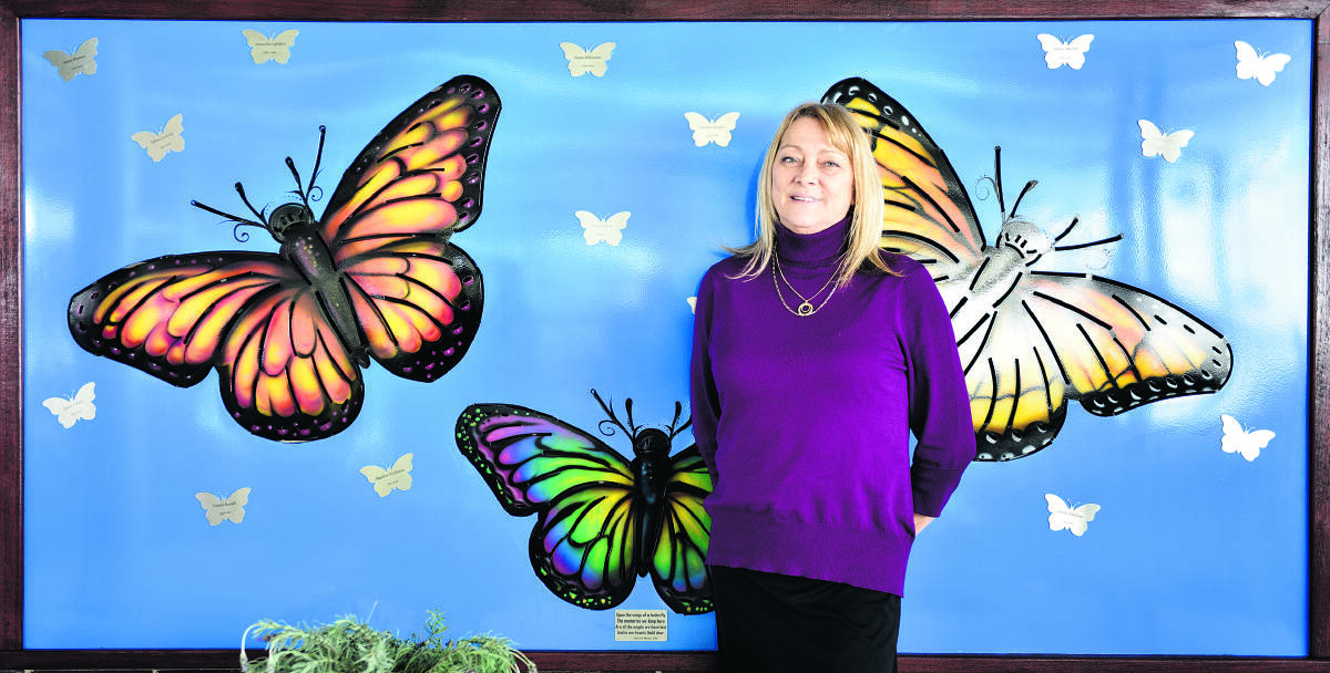 ‘QUITE A JOURNEY’:  Assistant principal Mandy Worton and the new butterfly memorial.	 Picture by CATH BOWEN 