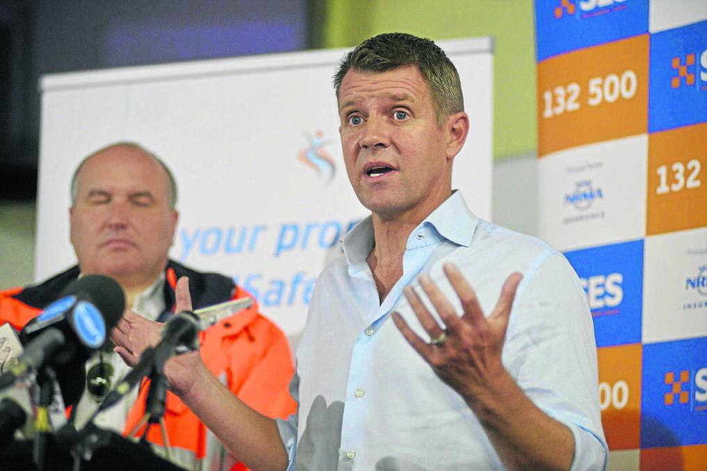 VISIT: Premier Mike Baird at the press conference in Metford on Thursday.