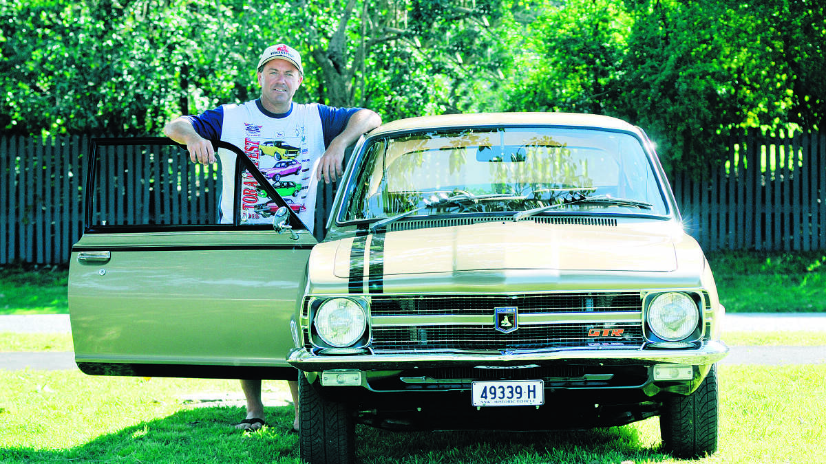 PROUD OWNER: The mighty Torana continues to hold fond memories for Holden fans like Scott Hudson, one of many who will proudly display their cars at Maitland Showground this weekend. Picture by CATH BOWEN