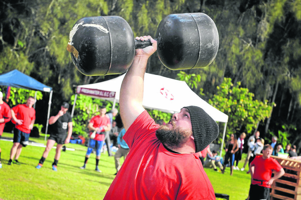 EASY PEASY:  Stewart Cook made it look easy as he lifted the 40kg weight above his head.  	Picture by PERRY DUFFIN 