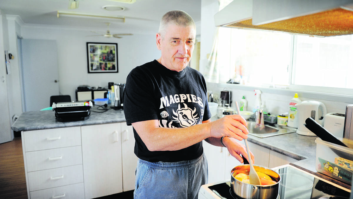 LEARNING TO COOK:  Mick Baker’s love of cooking has largely been enabled by Vision Australia, which had cookbooks printed in braille for him.