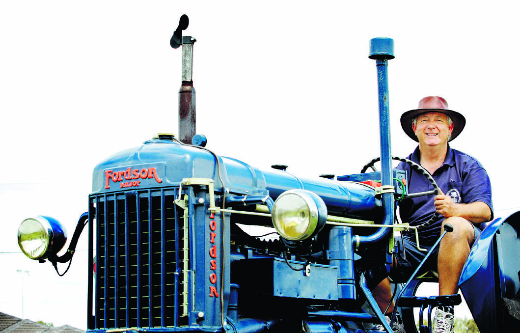 BLAST FROM THE PAST:  Bruce Rowley on board his 1951 Fordson Major tractor.  	