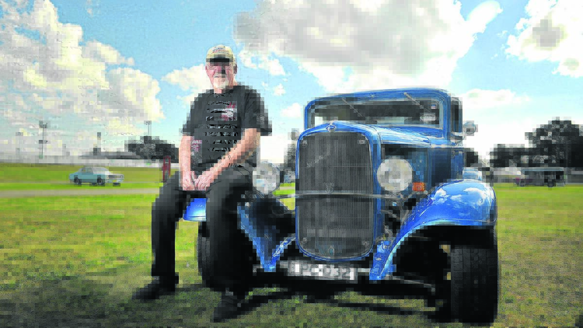 CAR SHOW:  Thornton hot rod enthusiast Paul Coombe enjoys Motorfest.	Picture PERRY DUFFIN 