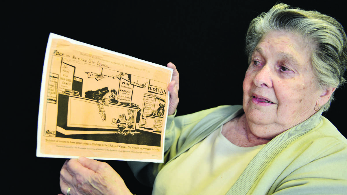SAME OLD JOKE:  Margaret McKenzie of Rutherford with the old Mercury cartoon from 1965.  	Picture by CATH  BOWEN 