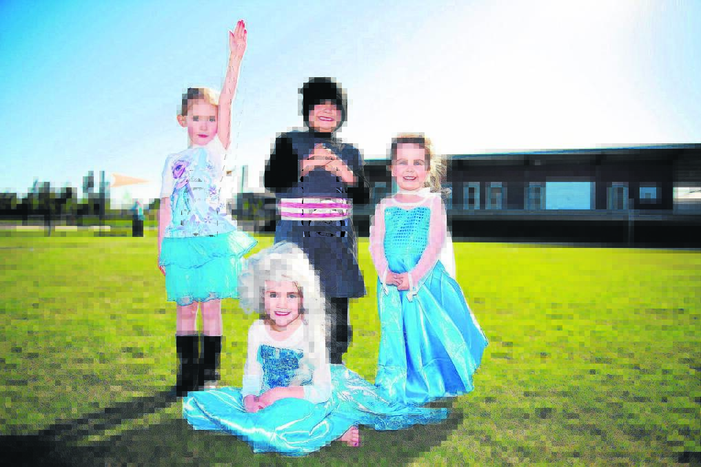 FROZEN FANS:  Hayley Sawtell, 4, Brody Peters, 5, Maci Forrester, 3, and (front) Heather Peters, 4, who will watch a movie to welcome in the new sportsground. 
	Picture by PERRY DUFFIN 