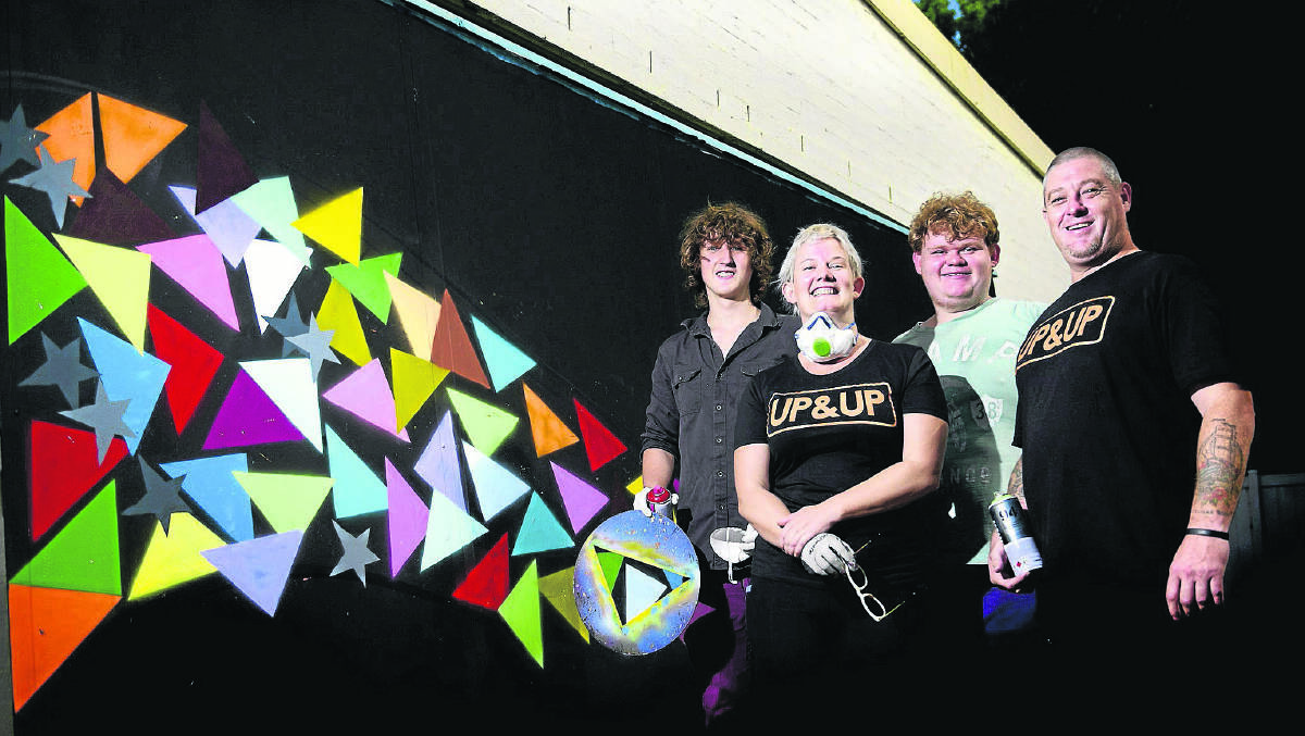 FACELIFT:  Matt Fergusson, Faith Curtis, Nichalos Whitbread and street artist Shane Tunz give High Street a splash of colour in readiness for Sun Street Festival.
Picture by PERRY DUFFIN
