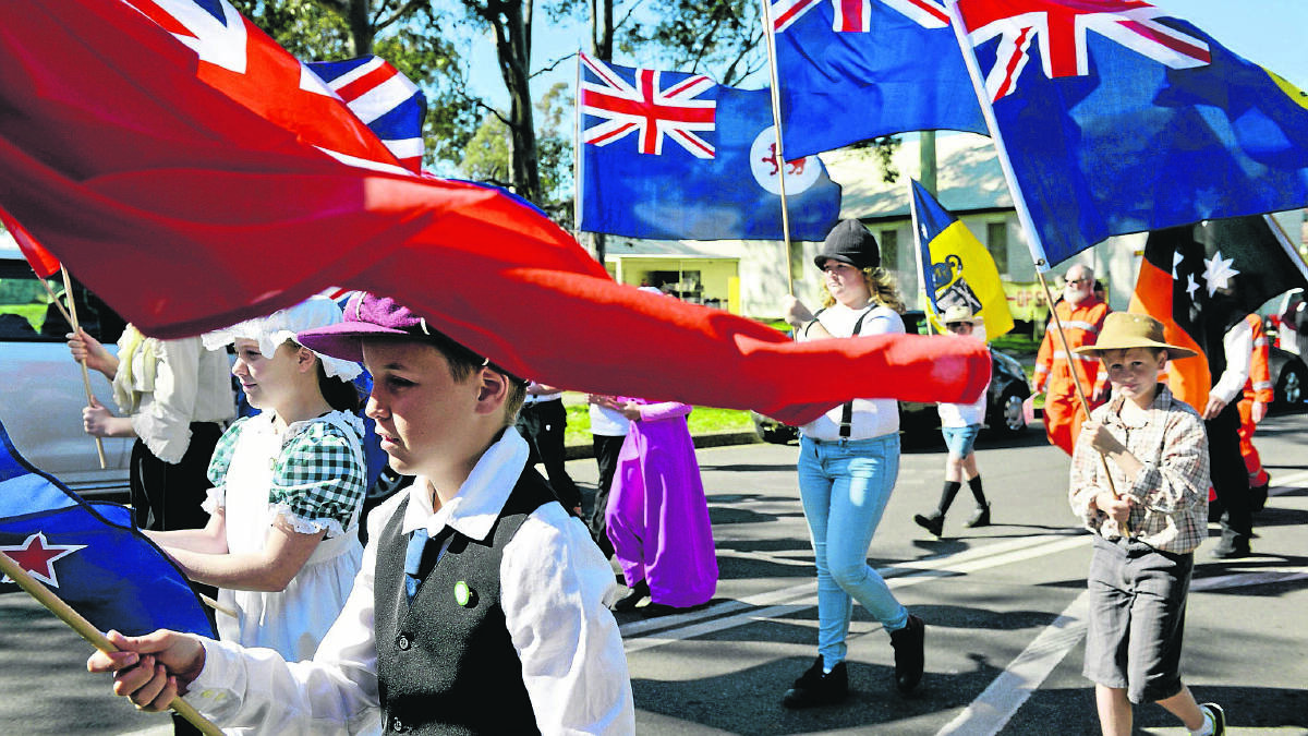 HISTORIC MARCH:  Thornton Public School flag bearer Lachlan Scott during last week’s first Australia Day ceremony re-enactment.	Picture by STUART SCOTT 