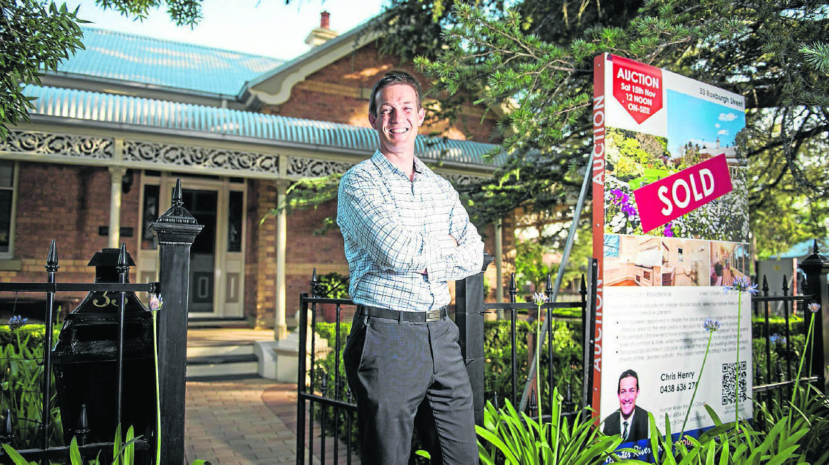 STRONG INTEREST: Hunter River Realty Group director Chris Henry outside historic Ingleburn in Lorn.	Picture by PERRY DUFFIN 
