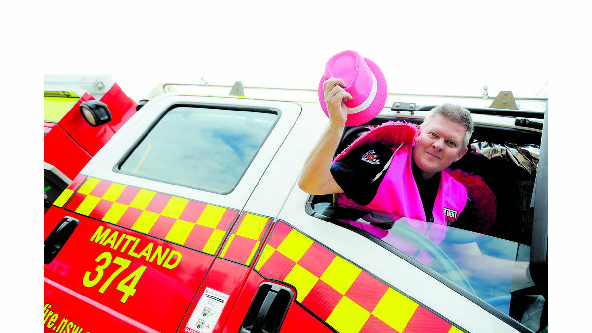 MEN GO PINK:  Maitland firefighter Matt Graves donned pink along with other Maitland men for the Real Men Wear Pink campaign to highlight breast cancer awareness.  	Picture by CATH BOWEN 